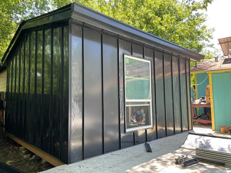 Black standing seam metal wall panels for Metal Roof Installation in North Highlands