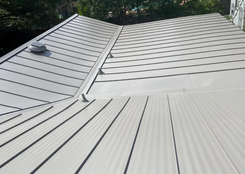 Solar attic fan installed on a metal roof for Roof Ventilation in North Highlands